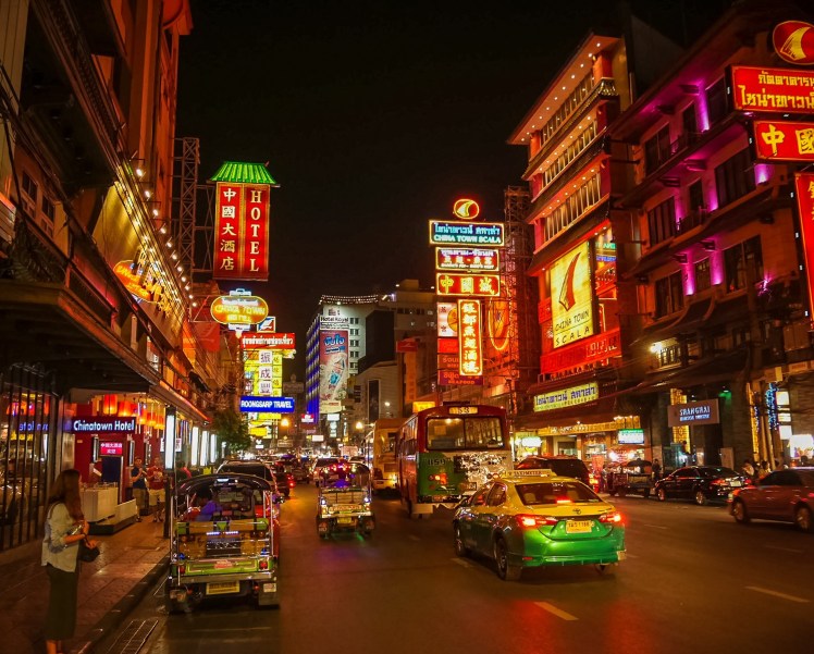 Tuk-tuks in the street in Chinatown in Bangkok