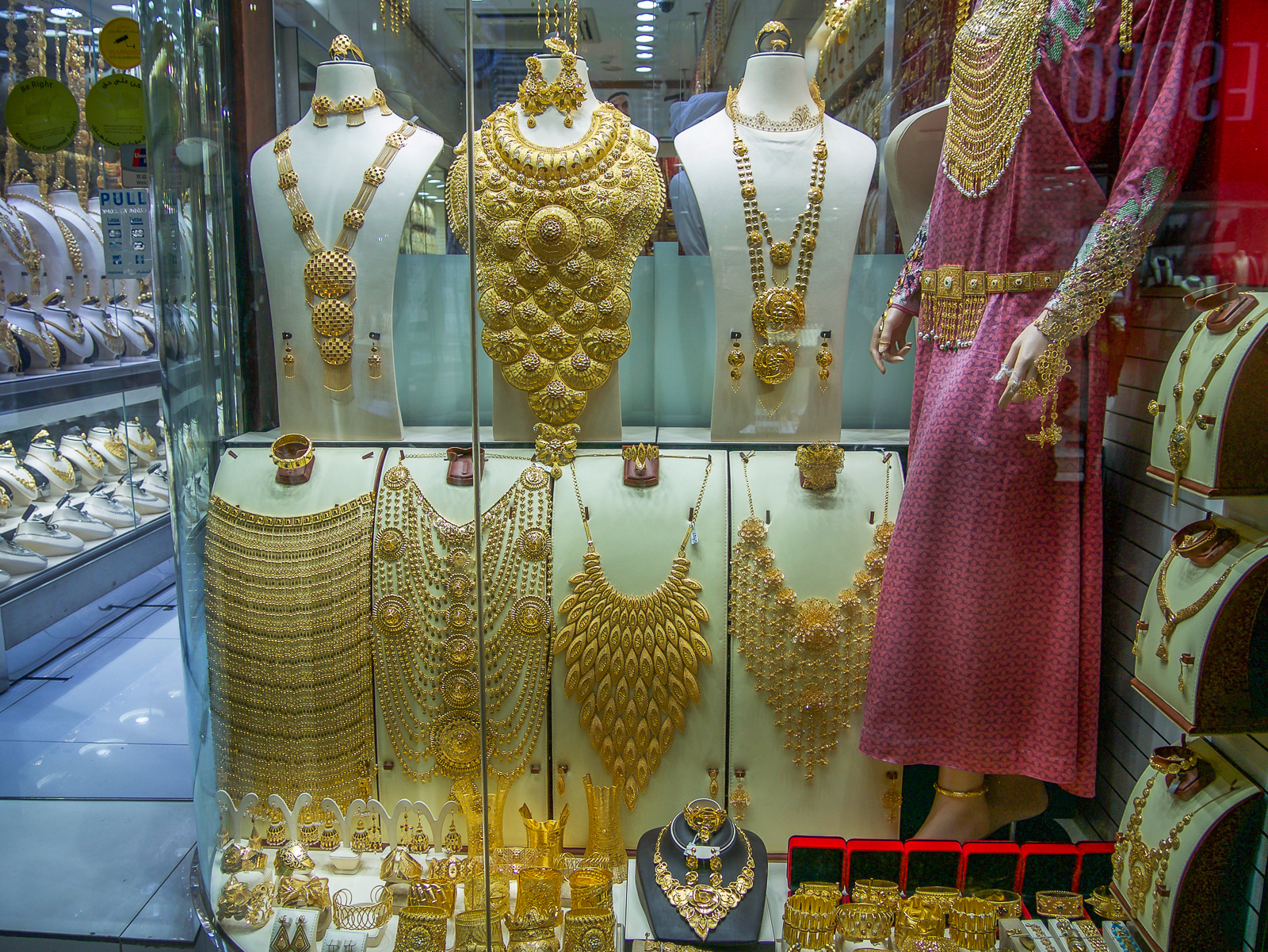 Gold necklaces on display in the Gold Souk